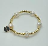 Gold plated beads with baroque pearls bracelet