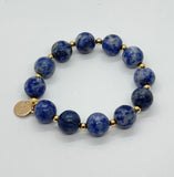 Blue sodalite gem stone bracelet with gold plated beads
