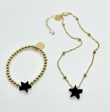Star shaped jet stone,  azabache.  Gold plated Beads   Gold plated necklace 